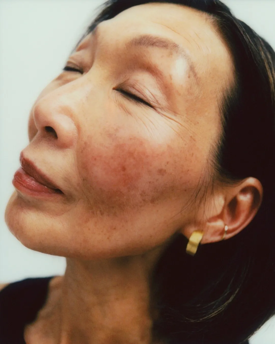 Woman with eyes closed, peaceful